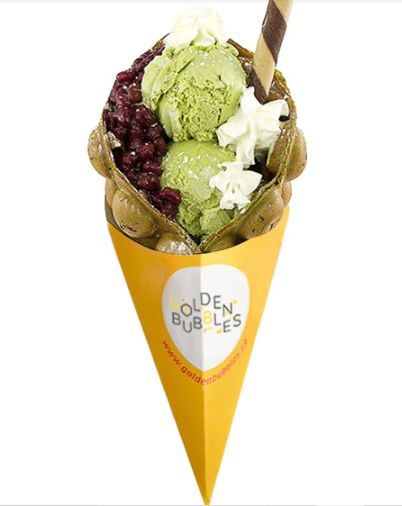A green cone with big bubbles and three delicious-looking flavours of ice cream throughout