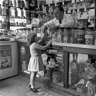 Vintage picture of a child in a candy shop