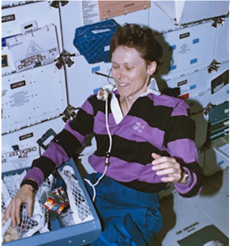 Roberta Bondar with dream cake in space