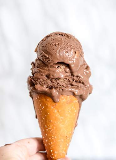 Chocolate PB ice cream in a pretzel cone How Sweet Eats