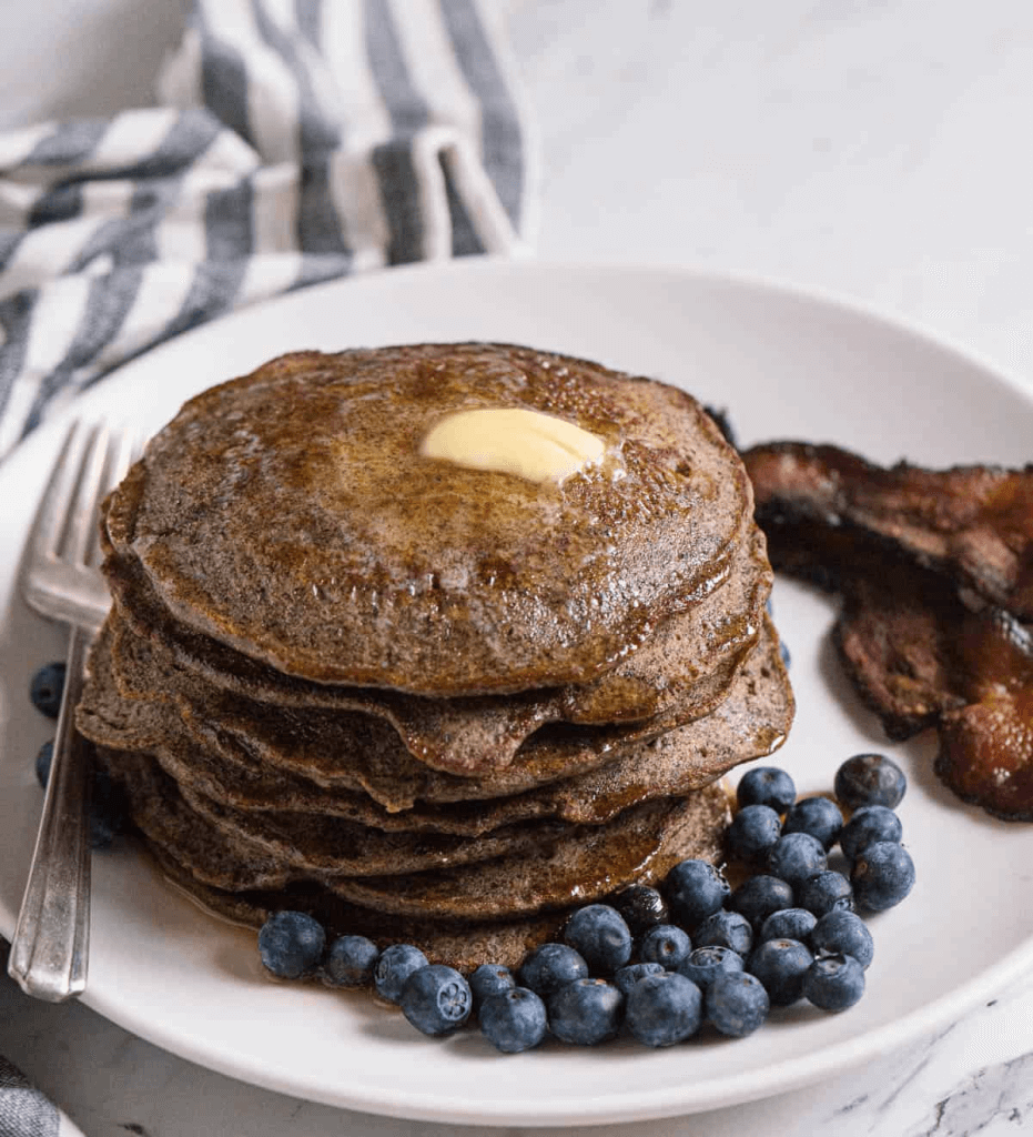 Buckwheat pancakes with blueberries and butter