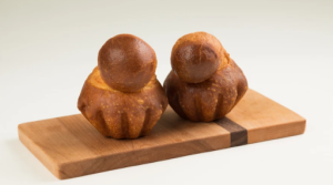 Brioche with head Fous Desserts Brioche with head Fous Desserts