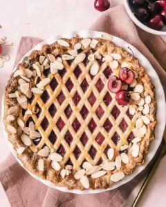 Cherry almond pie with roasted almond topping (Feedfeed)