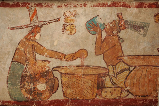 Paintings from the ancient Maya city of Calakmul depicting the preparation and drinking of cacao (National Geographic)